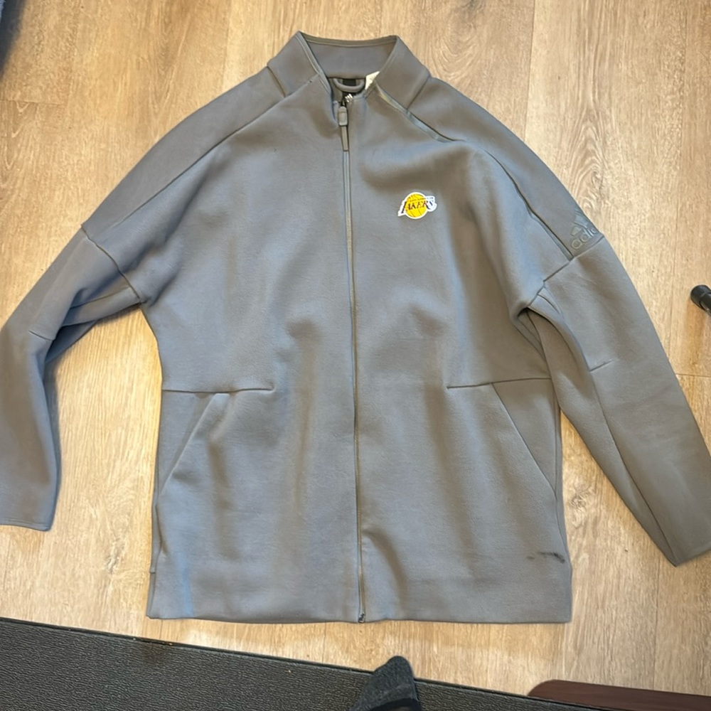 A slightly worn XXL official LA Lakers Adidas team jacket.